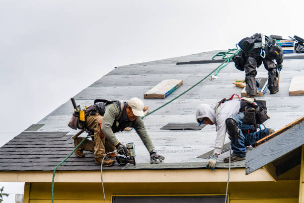 Professional Roofing technician working in South Glastonbury, CT